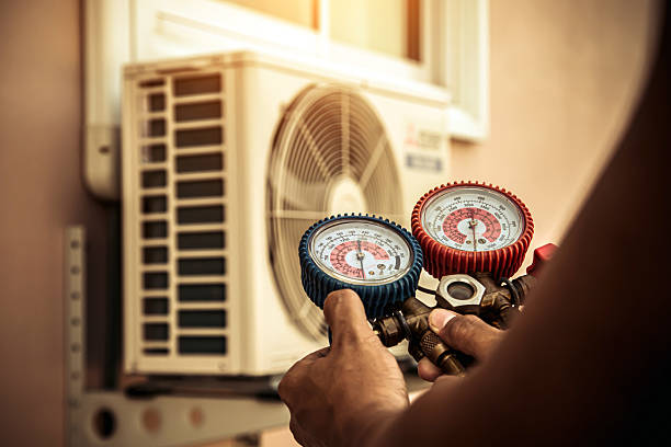 Professional Air Conditioning Service technician working in Pleasant Prairie, WI